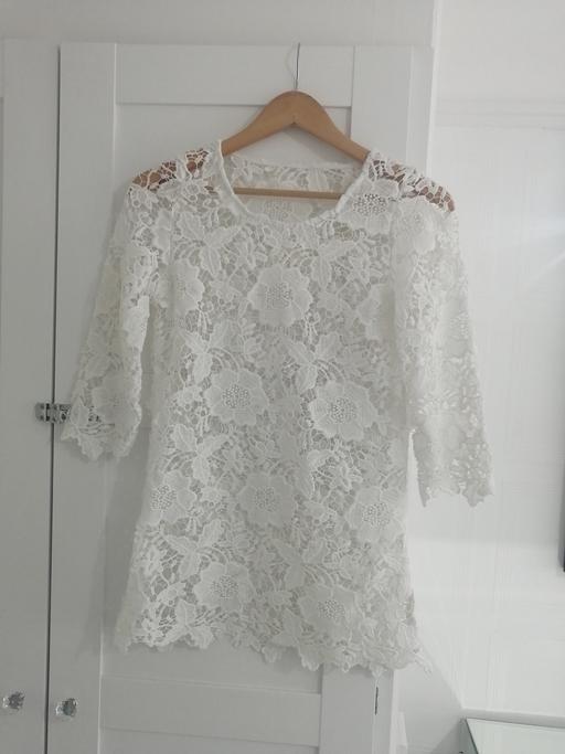  — women's size 10 white top