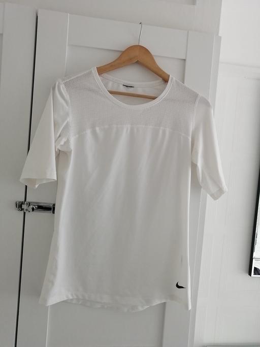  — Nike women's  medium white top