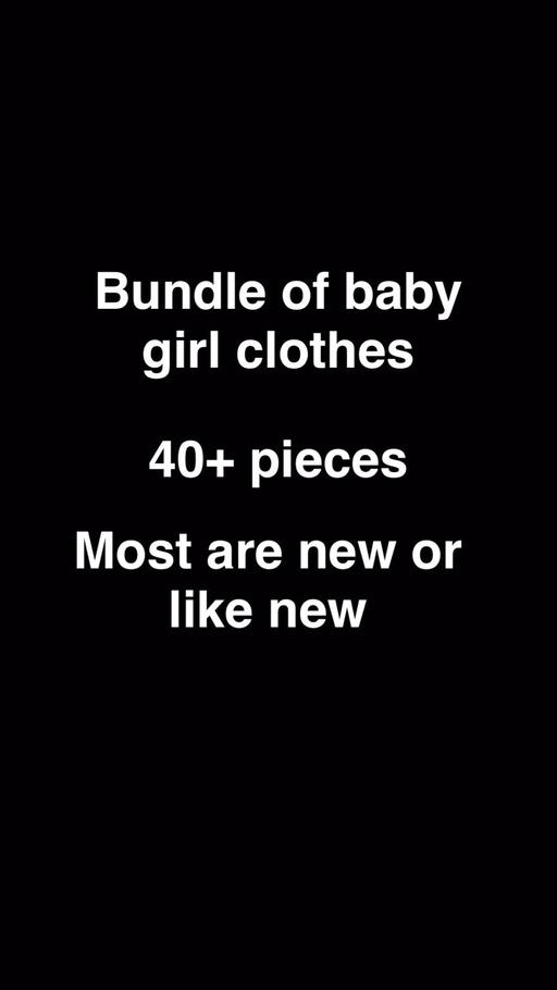  — Bundle of baby clothes