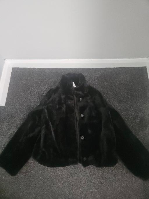  — women's fur coat