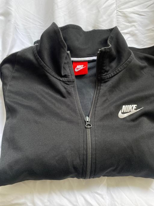  — Nike track jacket small black