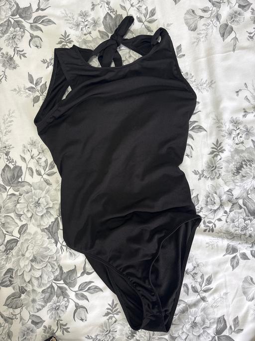  — Costume