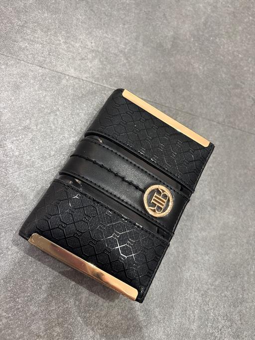  — Purse