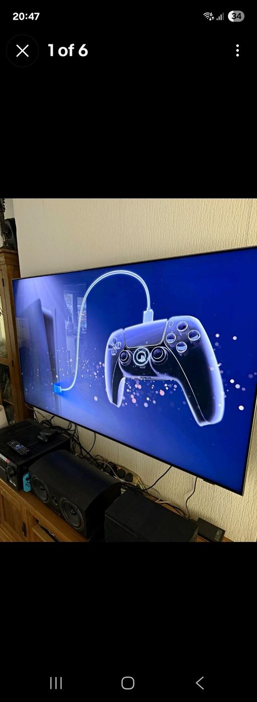  — playstation 5 console with controller and wir