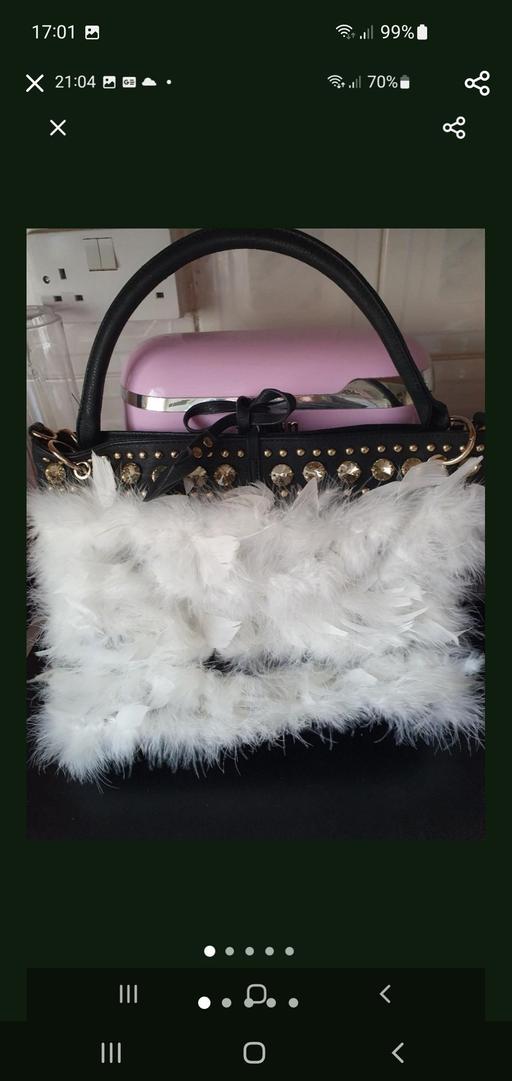  — ladies feather trim bag