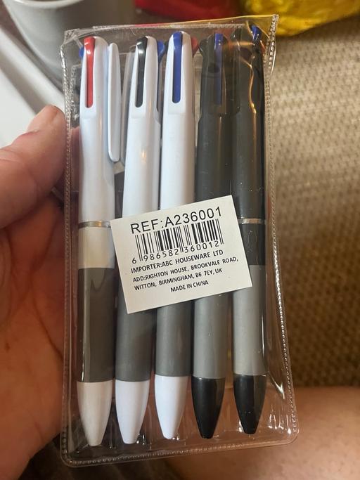  — Red blue black click pens