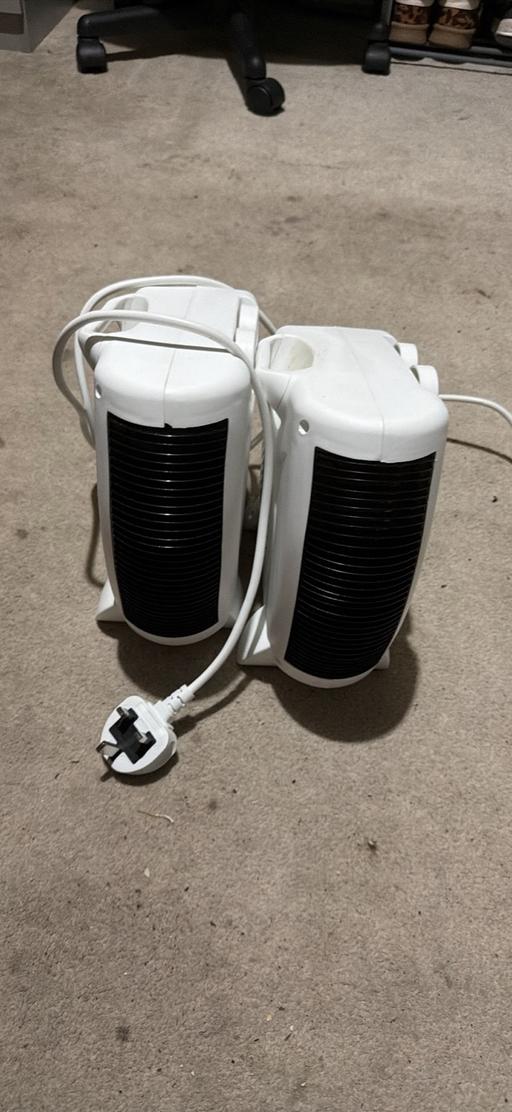  — 2 pair of fan heaters