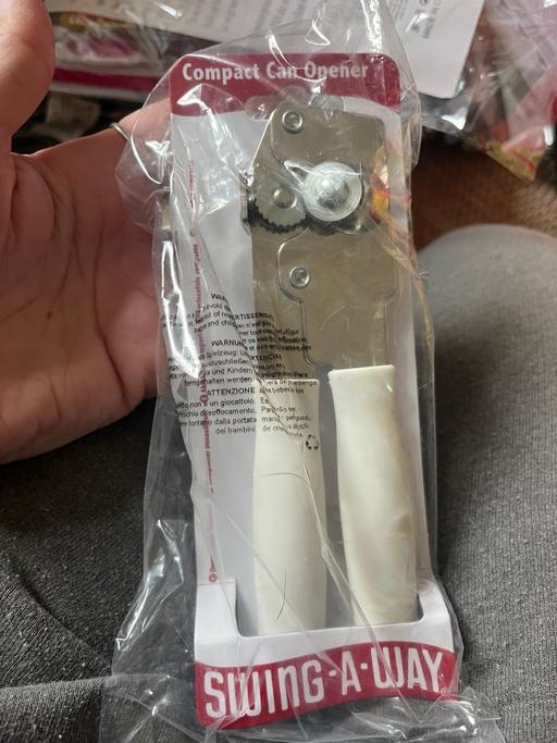  — New can opener 2£ a few
