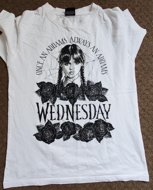  — Wednesday tee