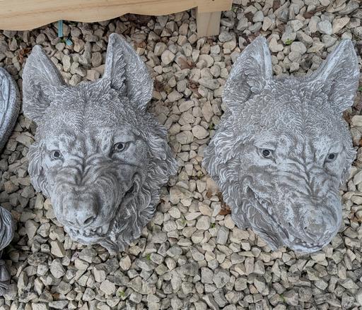  — Pair of Wolf Head Plaques
