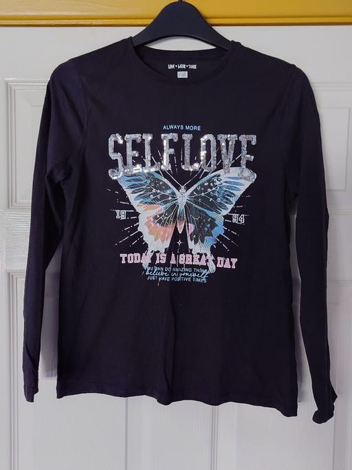  — Girls black long sleeve top size 11-12 years