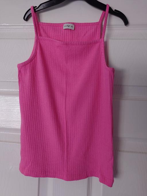  — Girls pink strap top size 10-11 years