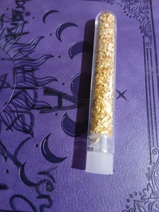  — Real GOLD24 flake's in a test tube.
