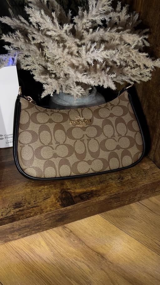  — Coach women’s shoulder bag