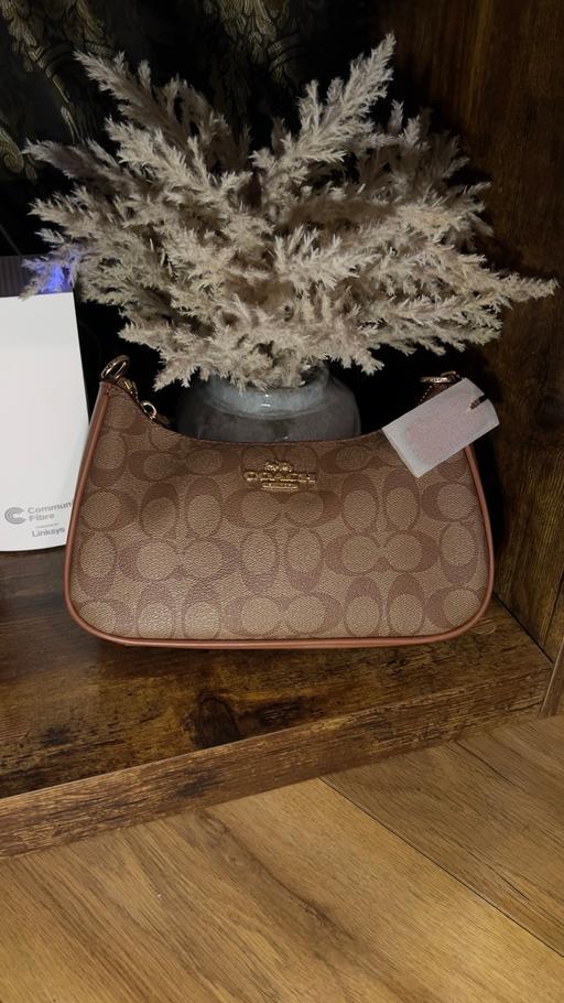  — Coach women’s shoulder bag