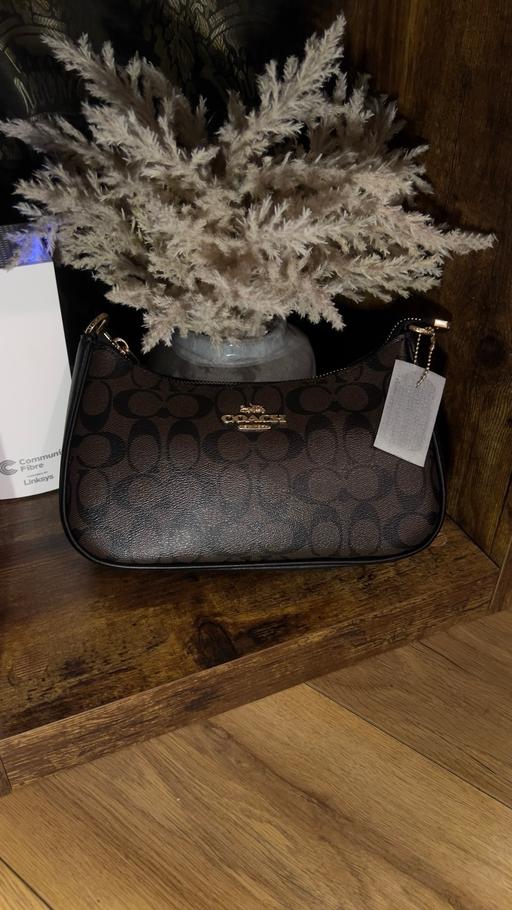  — Coach women’s shoulder bag