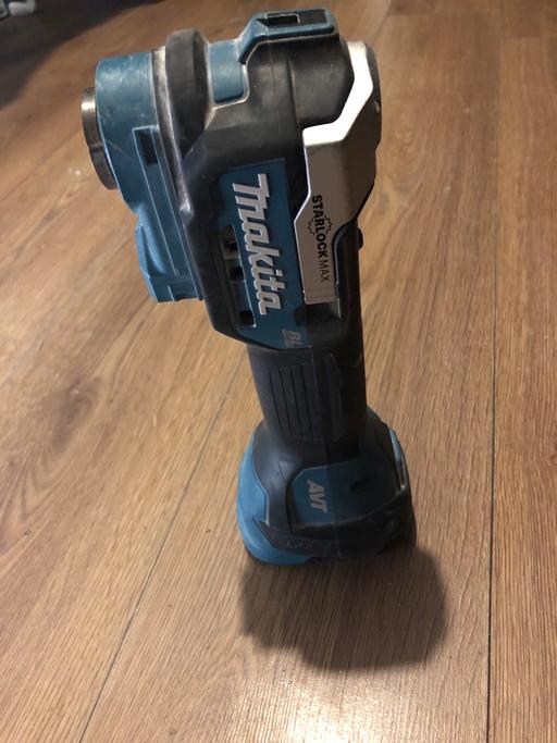  — MAKITA DTM52