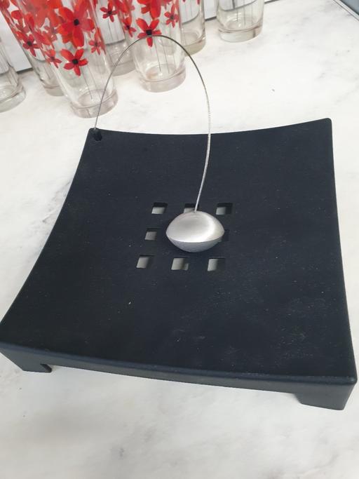  — Table napkin tray with weight