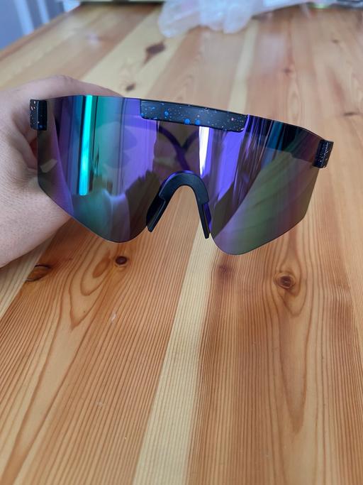  — Sunglasses