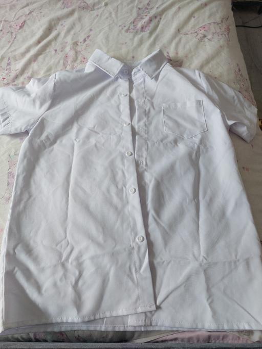  — brand new school shirt age 11-12