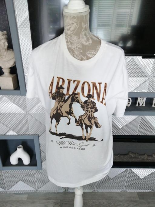  — ladies size *S* (2 small marks on back)