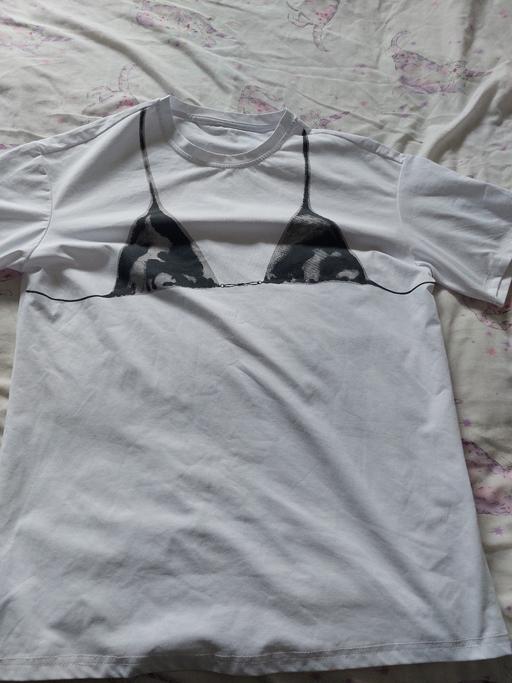  — over sized t-shirt size  small brand new