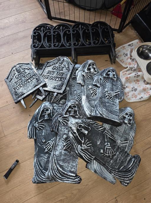  — Plastic gravestones and fencing.