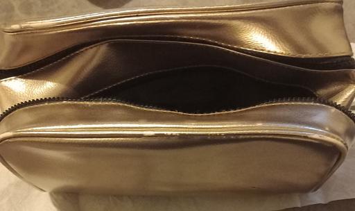  — gold makeup bag