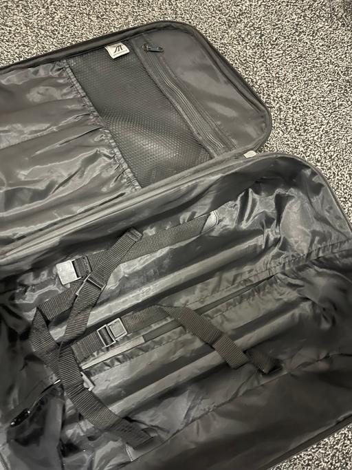  — Suitcase