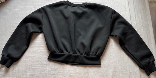  — Black sweater