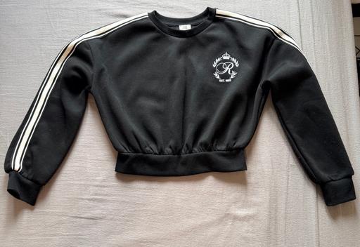  — Black sweater