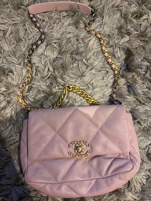  — Pink handbag with carry and shoulder straps