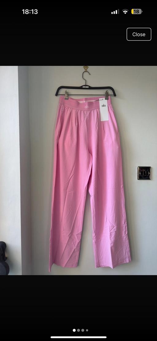  — Pink track pants