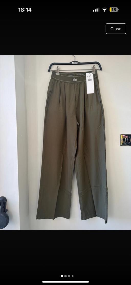  — Green track pants
