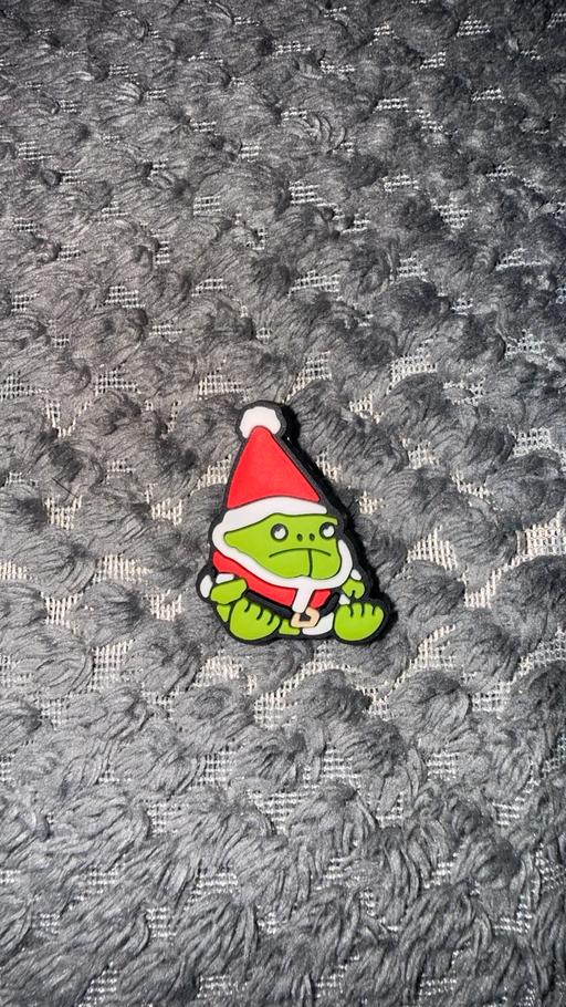 — Grumpy frog santa croc charm