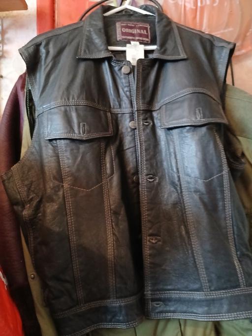  — man's black leather waiscoat
