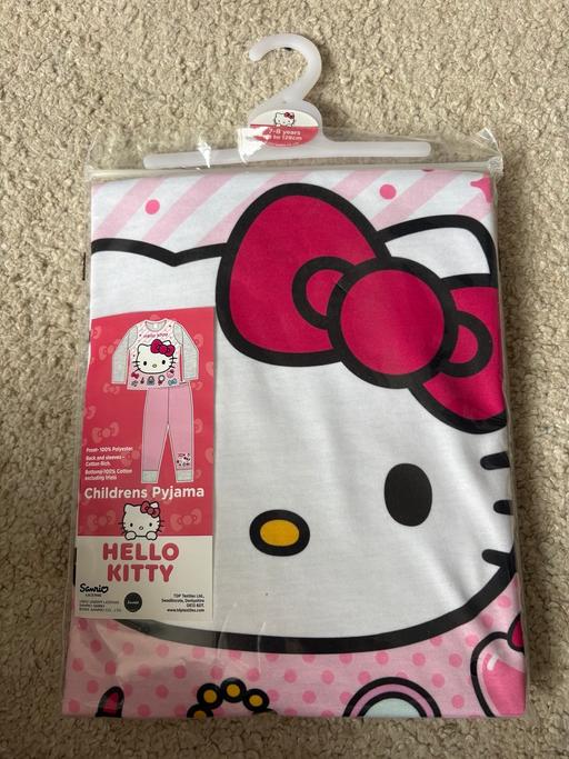  — Hello kitty pjs size 7-8 & 9-10 years