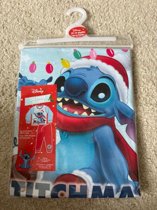  — Stitch Christmas pjs (few sizes)