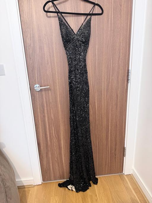  — SCALA long black sequin dress.