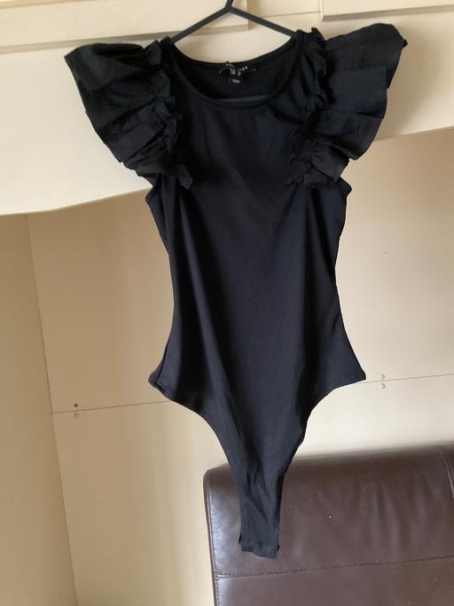  — new look body suit