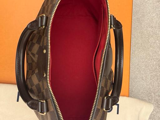  — Louis Vuitton