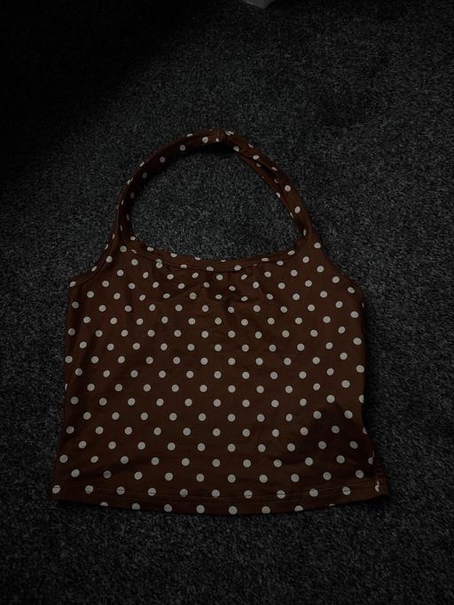 — A polkadot crop top