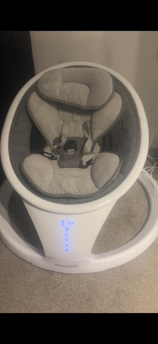  — Munchkin electric baby rocker