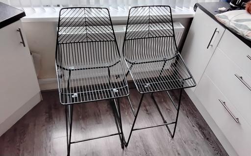  — 2 metal bar stools & free metal chair