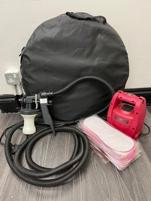  — Spray tan machine and tent