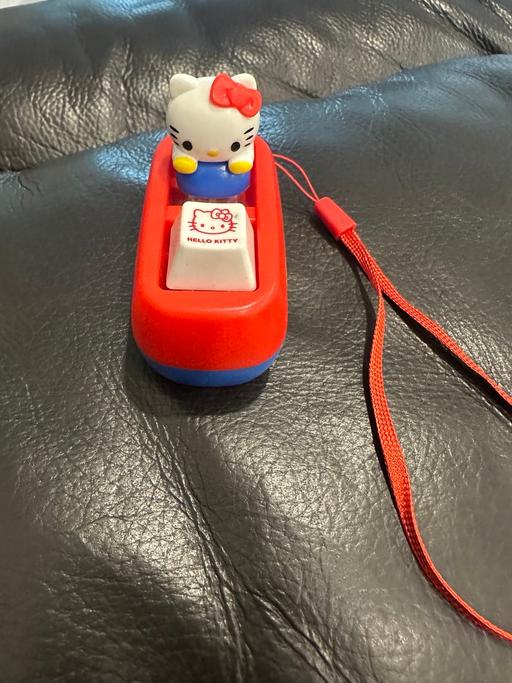  — Hello kitty led light up click fidget