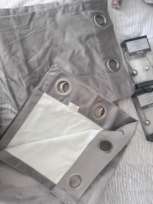  — Silver/grey blackout curtains with tie backs