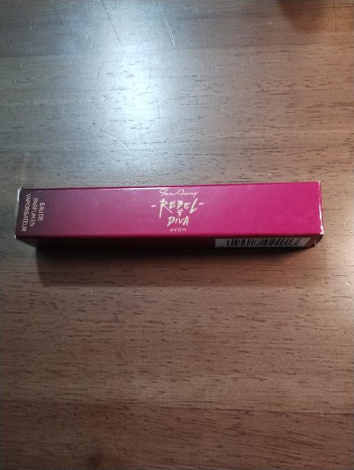  — Avon far away rebel perfume