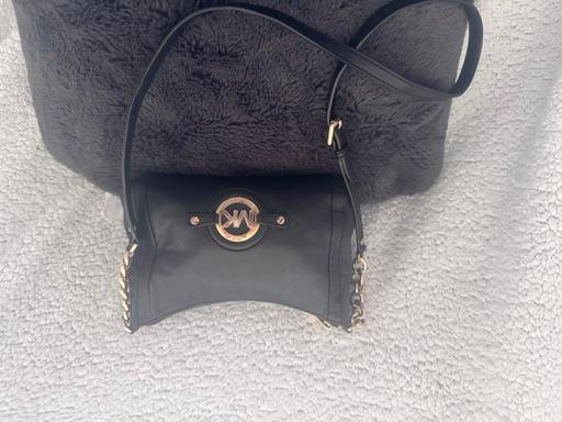  — Michael Kors black leather crossbody bag