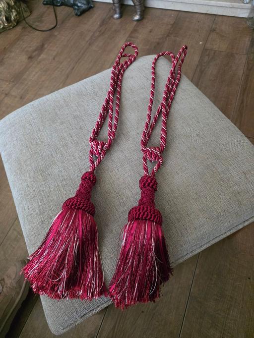  — PAIR OF TIEBACKS IN DEEP RED